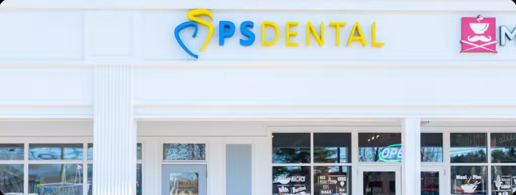 The image shows a sign with the text  SP DENTAL  on a building, indicating the presence of a dental practice named SP Dental at that location.