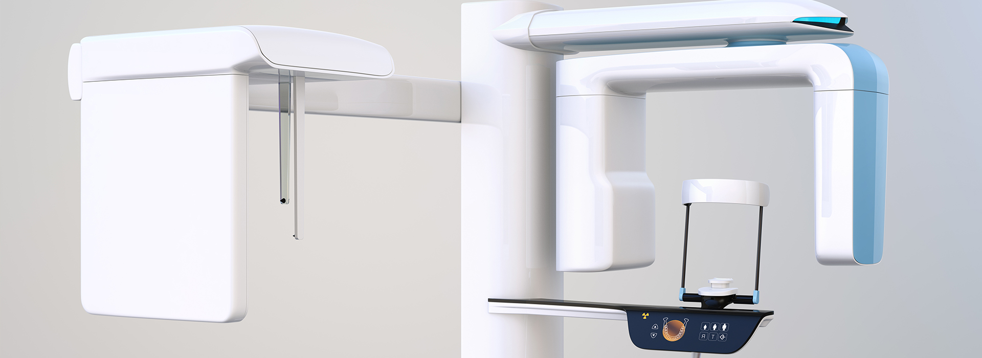 The image shows a medical setting with a dental chair and an overhead fluoroscope machine.